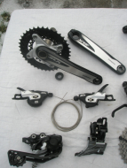 Kompletní řadící sada Shimano SLX/XT + brzdy Shimano Deore