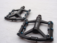 Téměř nové pedály Exustar E-PB557